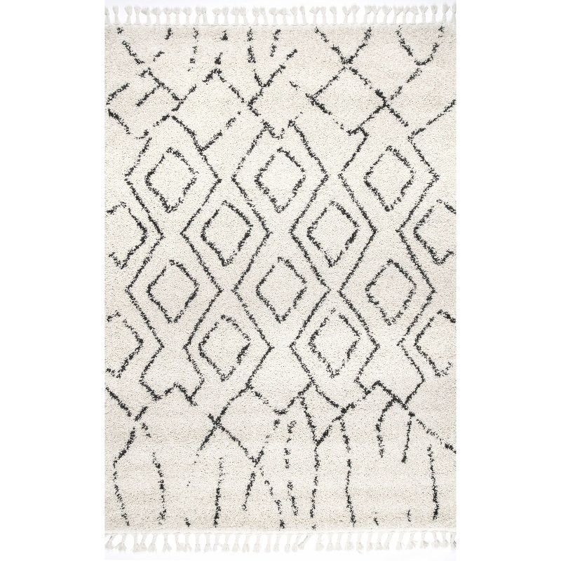 Ivory Geometric Synthetic Rectangular Area Rug with Tassels