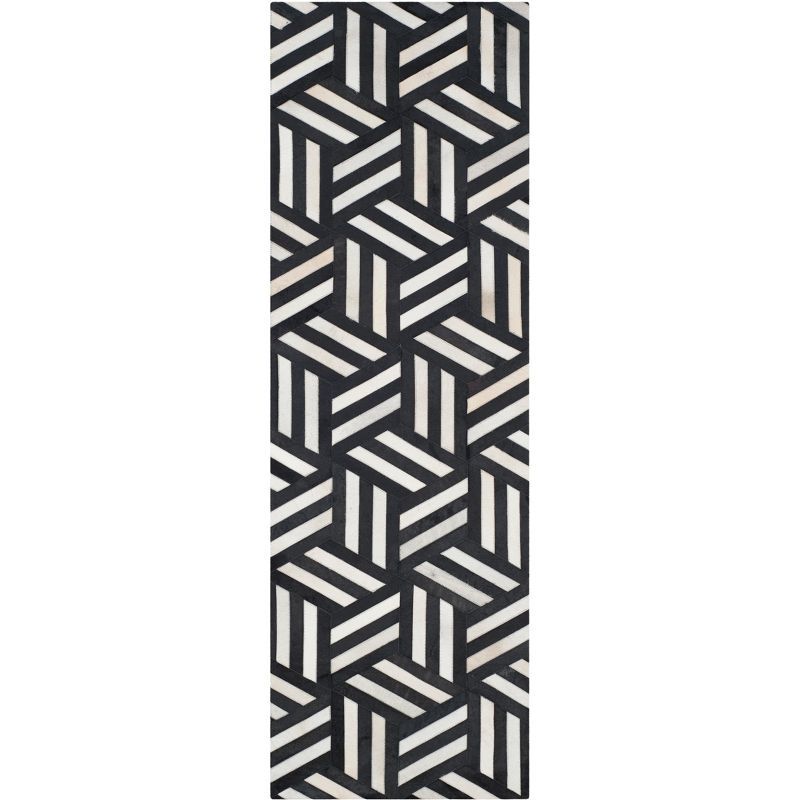 Handmade Black Geometric Cowhide Rug - 27" x 11"