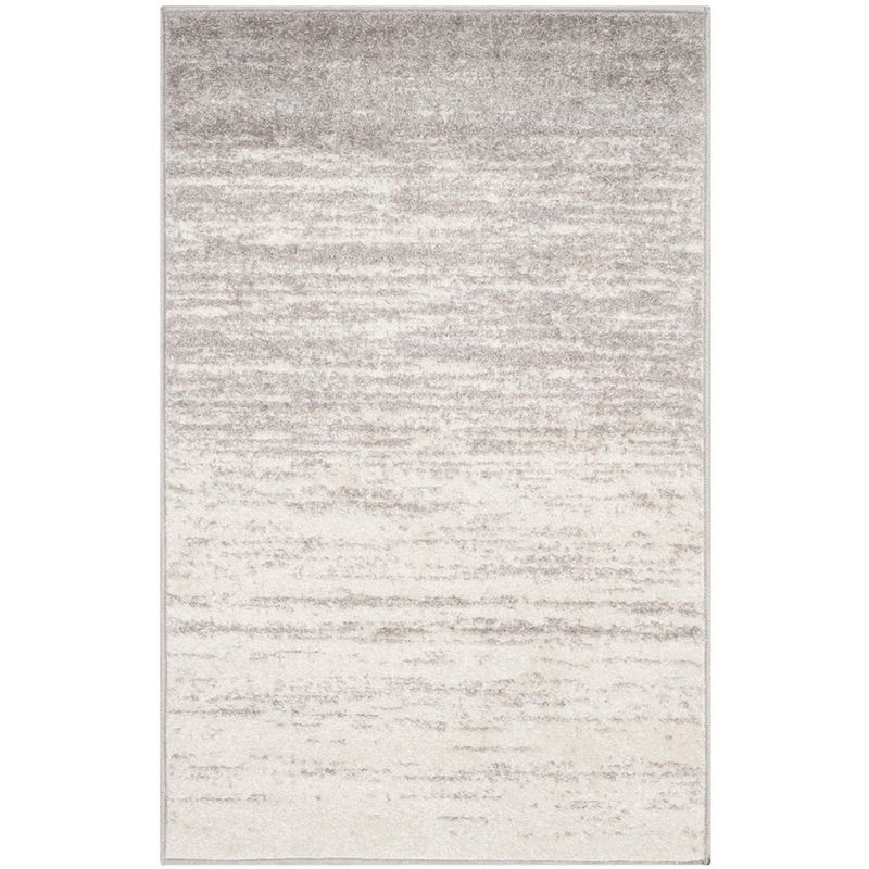 Ivory and Silver Low Pile Abstract Area Rug