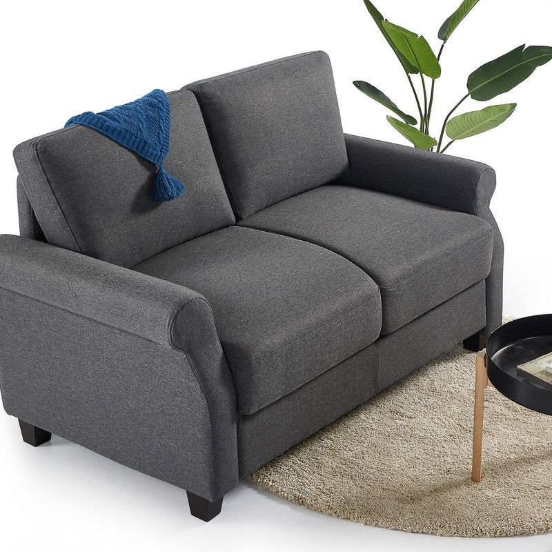 45.7" Dark Grey Fabric Loveseat with Round Arms and Metal Accents