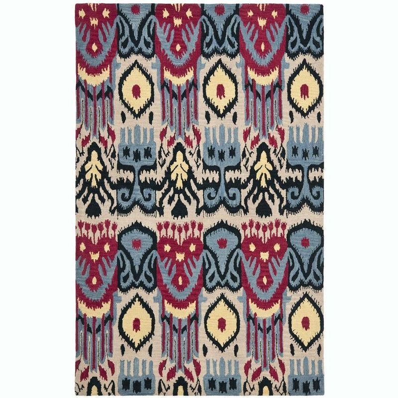 Handmade Blue and Beige Wool Ikat Area Rug 6' x 9'