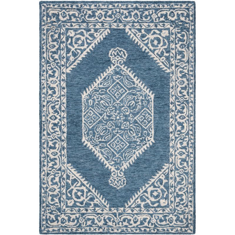 Blue and Ivory Tufted Wool 4' x 6' Area Rug