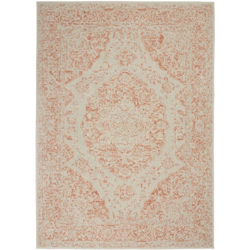 Ivory and Pink 5'3" x 7'3" Synthetic Rectangular Area Rug