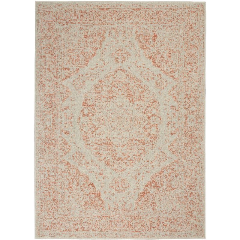 Ivory and Pink 5'3" x 7'3" Synthetic Rectangular Area Rug