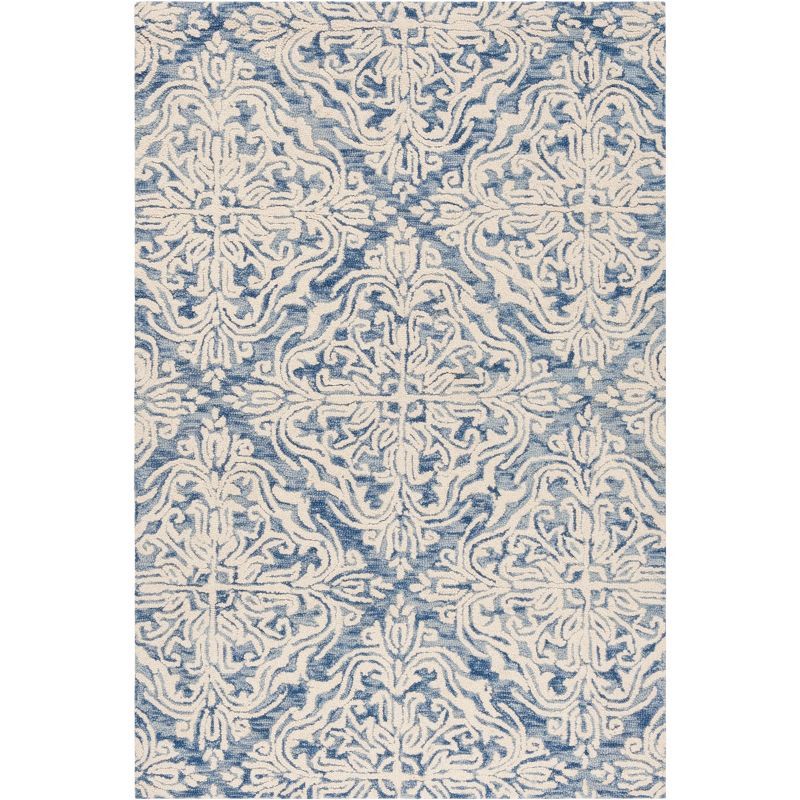 Blue and Ivory Floral Tufted Wool 4' x 6' Area Rug