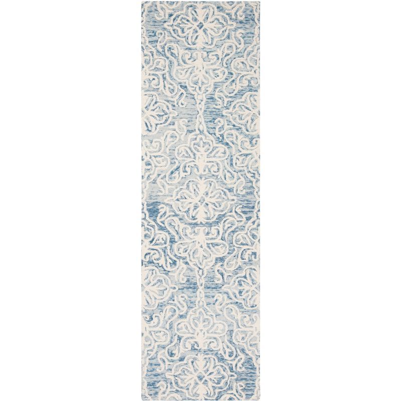 Handmade Tufted Blue/Ivory Floral Wool Area Rug