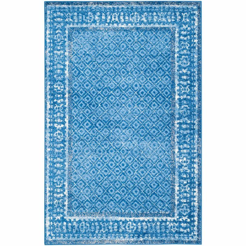 Light Blue and Dark Blue Floral Motif Area Rug