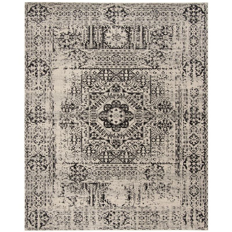 Ivory and Black Floral Motif Synthetic Area Rug