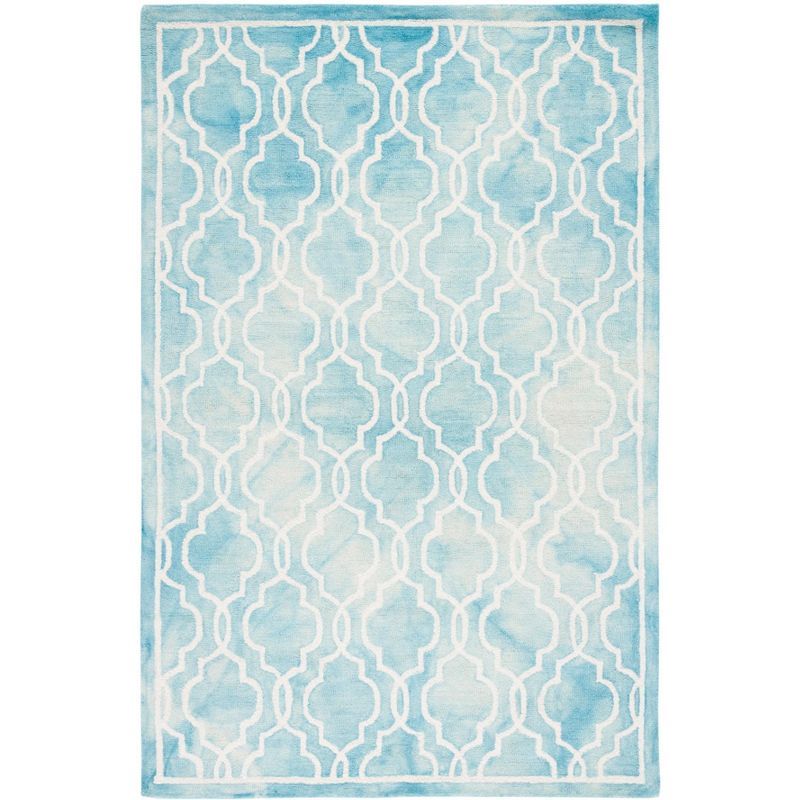 Handmade Turquoise and Ivory Wool 6' x 9' Rectangular Area Rug