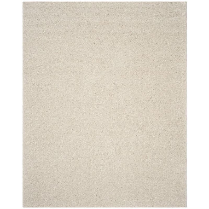 Cream 8' x 10' Tufted Shag Area Rug