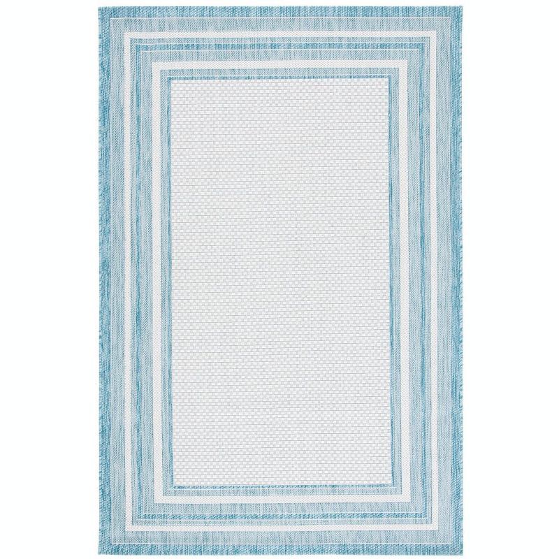 Ivory and Aqua Rectangular Reversible 9' x 12' Easy-Care Area Rug