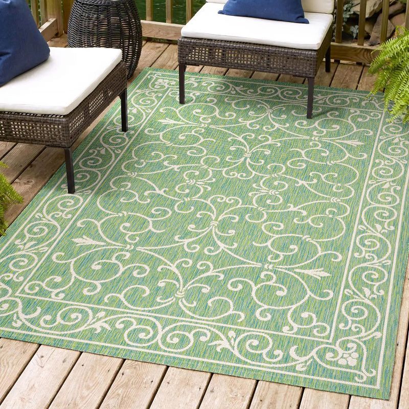 8' x 10' Green and Ivory Synthetic Flat Woven Rectangular Area Rug