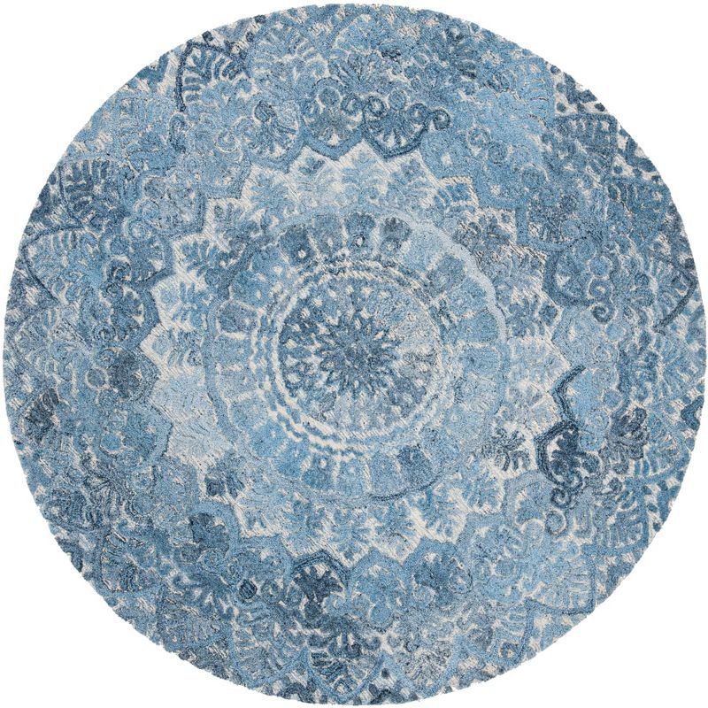 Handmade Round Blue and Ivory Wool Area Rug