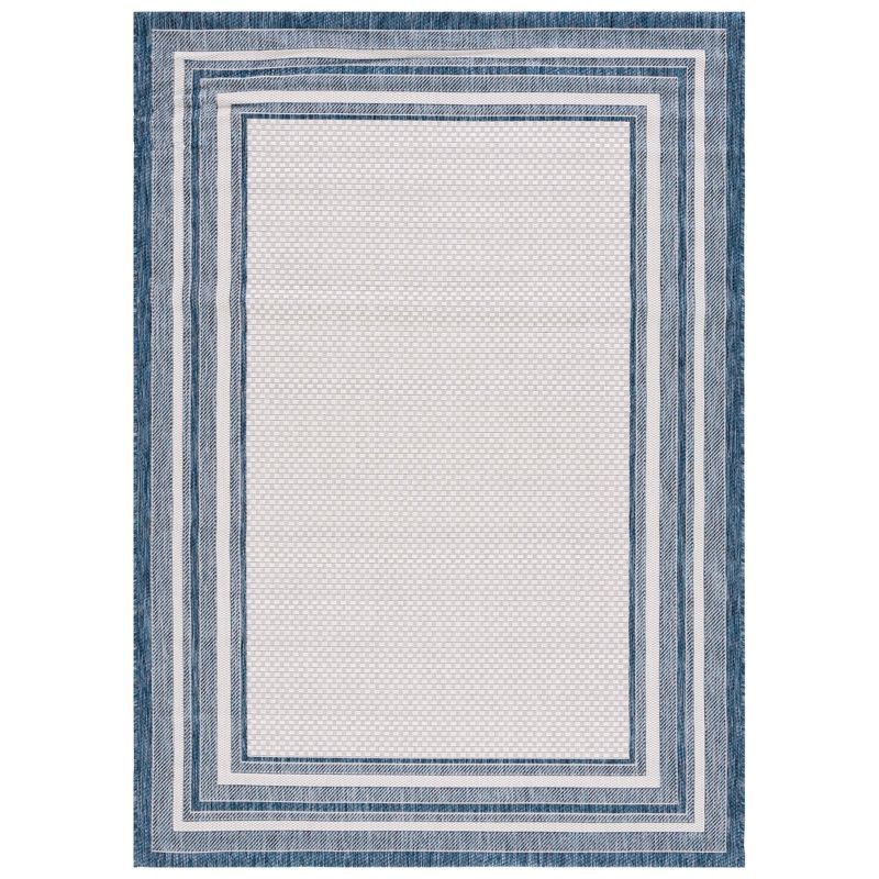 Ivory and Navy Rectangular Synthetic Indoor/Outdoor Rug