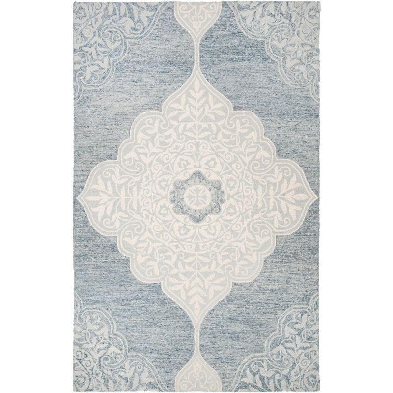 Handmade Tufted Blue and Ivory Wool Area Rug