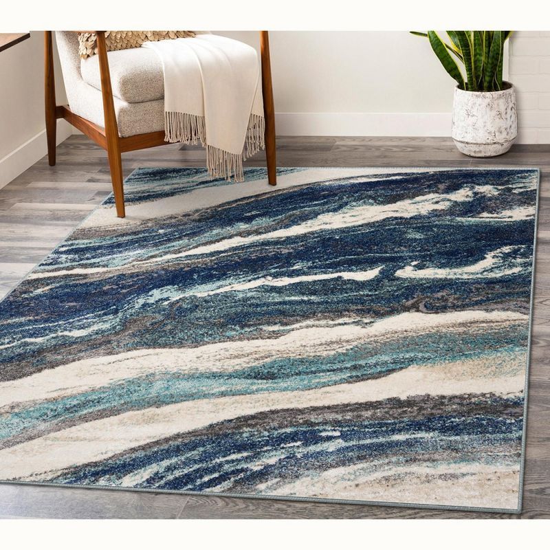 Blue and White Abstract 8' x 10' Synthetic Area Rug