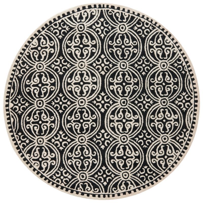 Black and Ivory Round Hand-Tufted Wool Area Rug