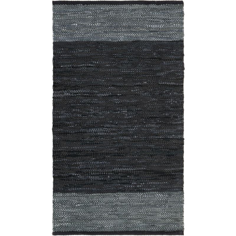 Mod-Chic Black and Grey Handmade Cowhide & Synthetic Flatweave Rug, 2' x 3'