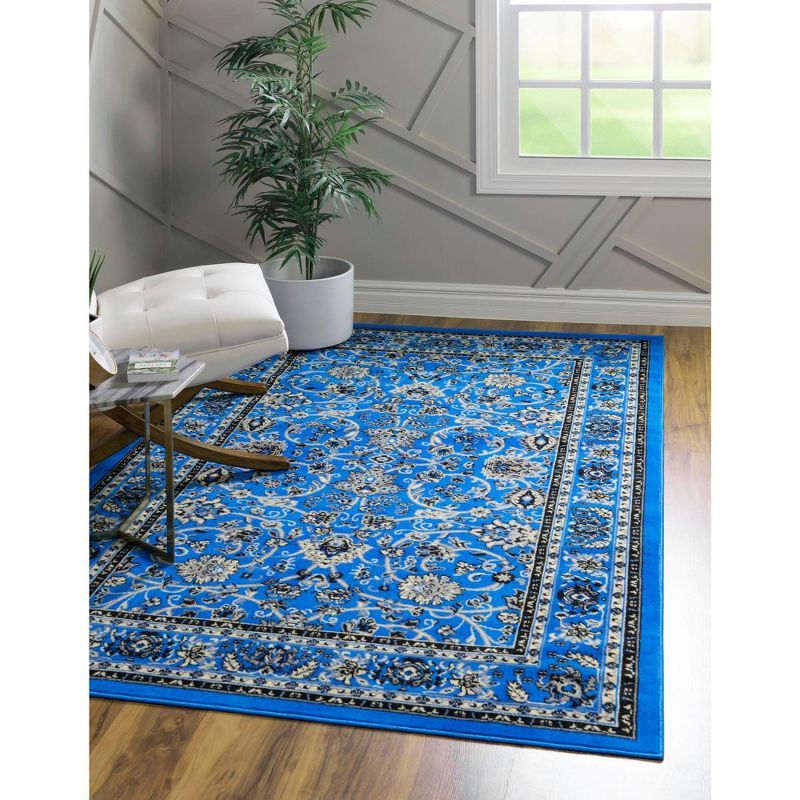 Rectangular Blue and Ivory Synthetic Stain-Resistant Area Rug