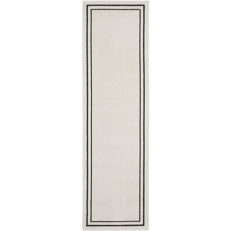 Nourison Essentials Double Bordered Ivory & Black Outdoor Rug