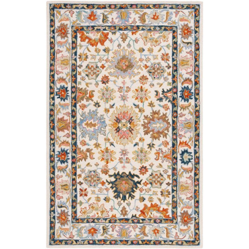 Ivory and Blue Handmade Tufted Wool Area Rug 6' x 9'