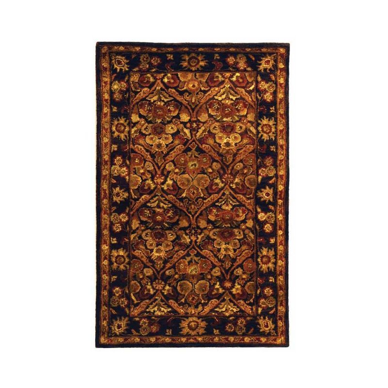 Antiquity Hand Tufted Wool Area Rug in Dark Plum and Gold