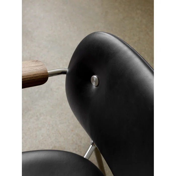 Cozy Minimalist Black Leather and Chrome Dining Chair with Armrests