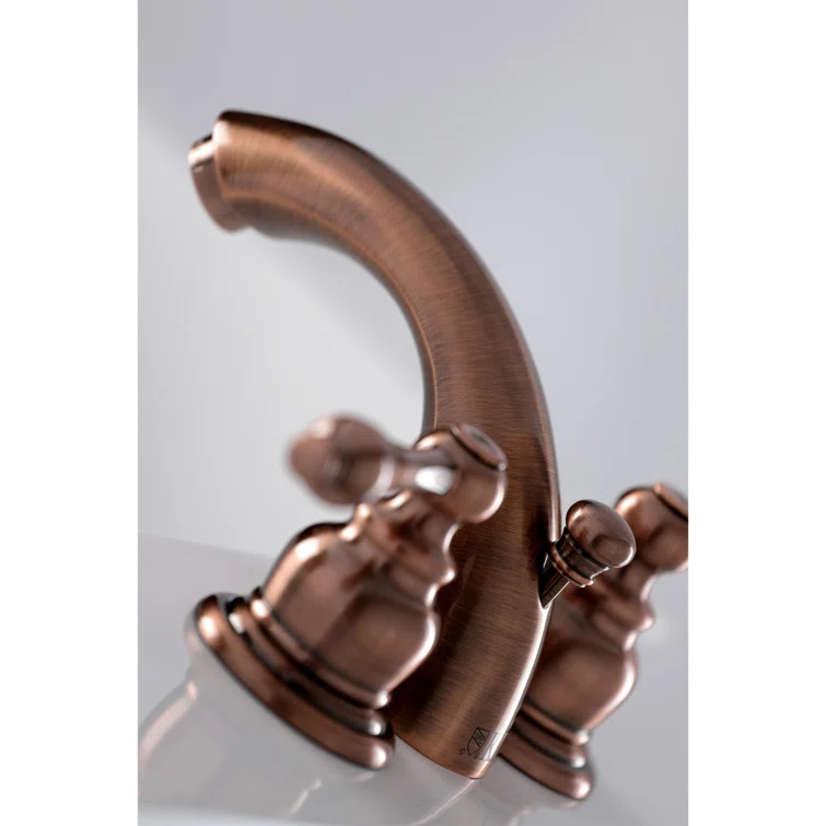 Kingston Brass Victorian Two-Handle 3-Hole Deck Mount Mini-Widespread Bathroom Faucet with Plastic Pop-Up