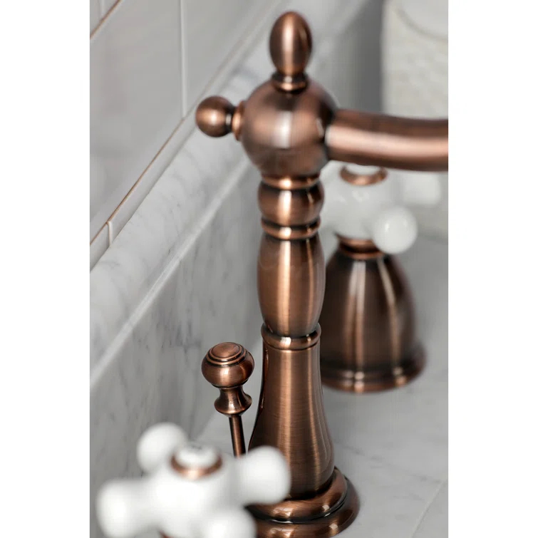 Kingston Brass Heritage Two-Handle 3-Hole Deck Mount Widespread Bathroom Faucet with Brass Pop-Up Drain