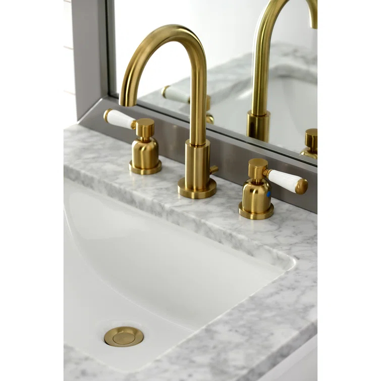 Kingston Brass Paris Two-Handle 3-Hole Deck Mount Widespread Bathroom Faucet with Brass Pop-Up Drain