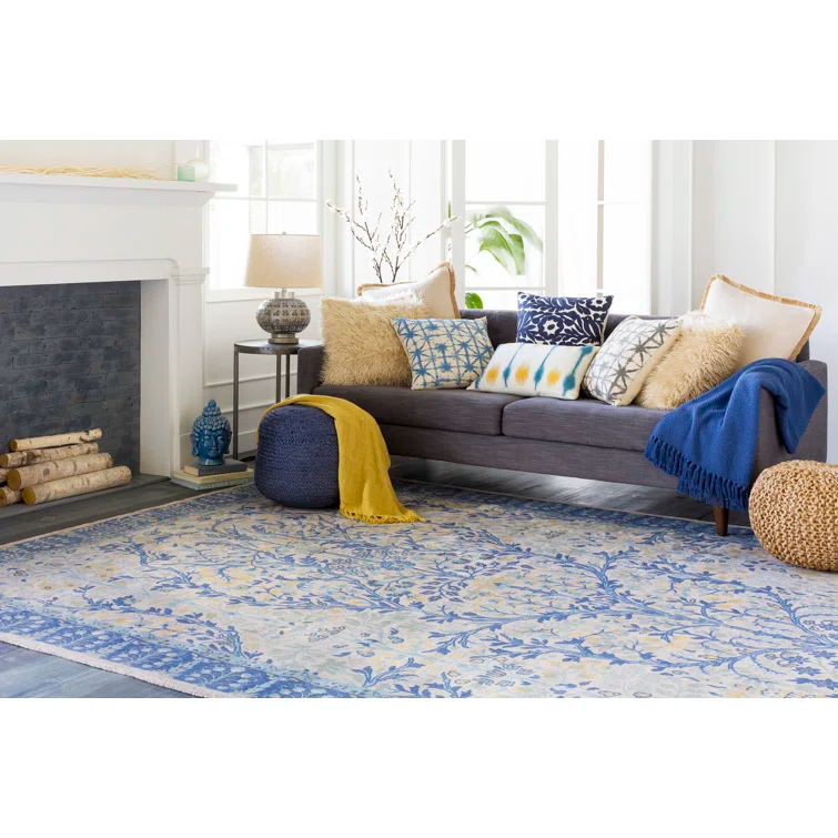 Rodriguez Upholstered Pouf