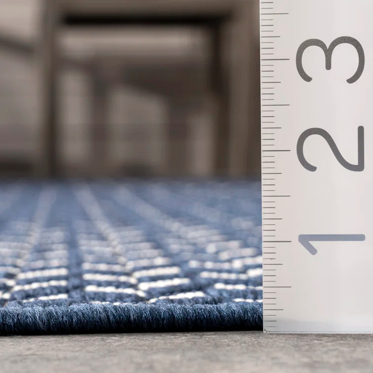 Jaylah Herringbone Chevron Navy Blue Indoor/Outdoor Area Rug