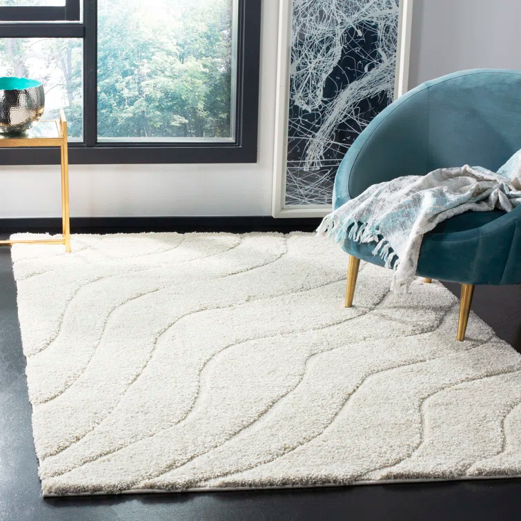 Ashal Abstract Cream Area Rug