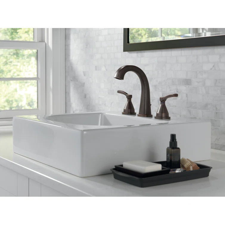 Stryke Widespread Bathroom Faucet with Drain Assembly and DIAMOND™ Seal Technology
