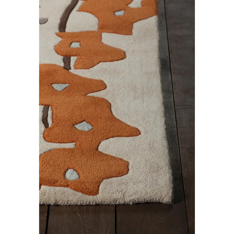Handmade White and Orange Floral Wool Area Rug 5' x 7'