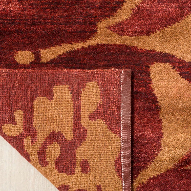 Hand-Knotted Geometric Red Wool 6' x 9' Area Rug