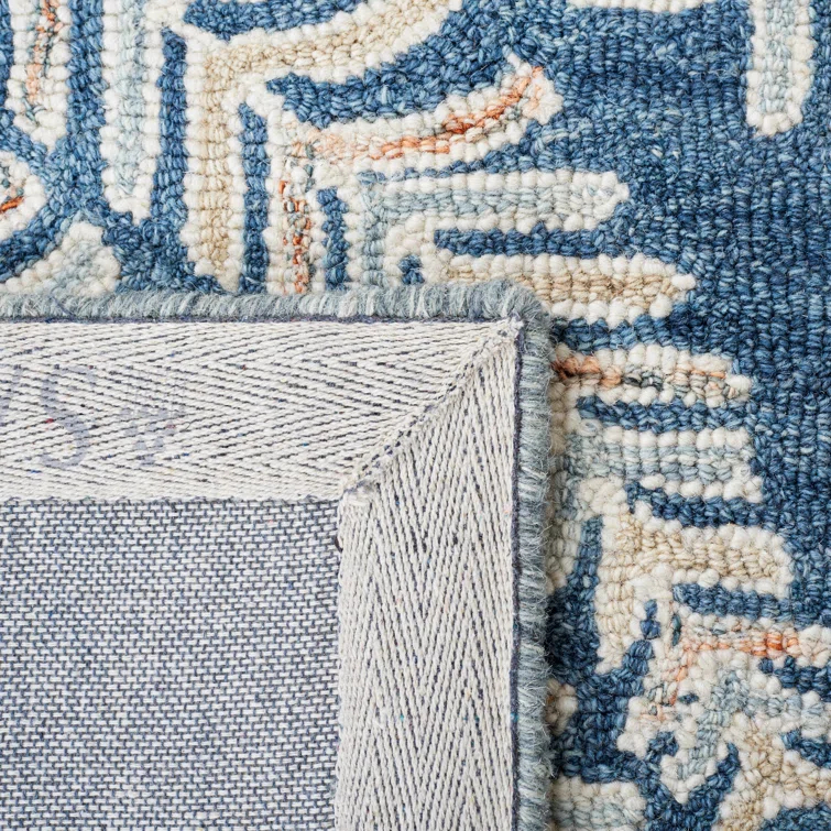 Chaithra Hand Tufted Wool Floral Rug