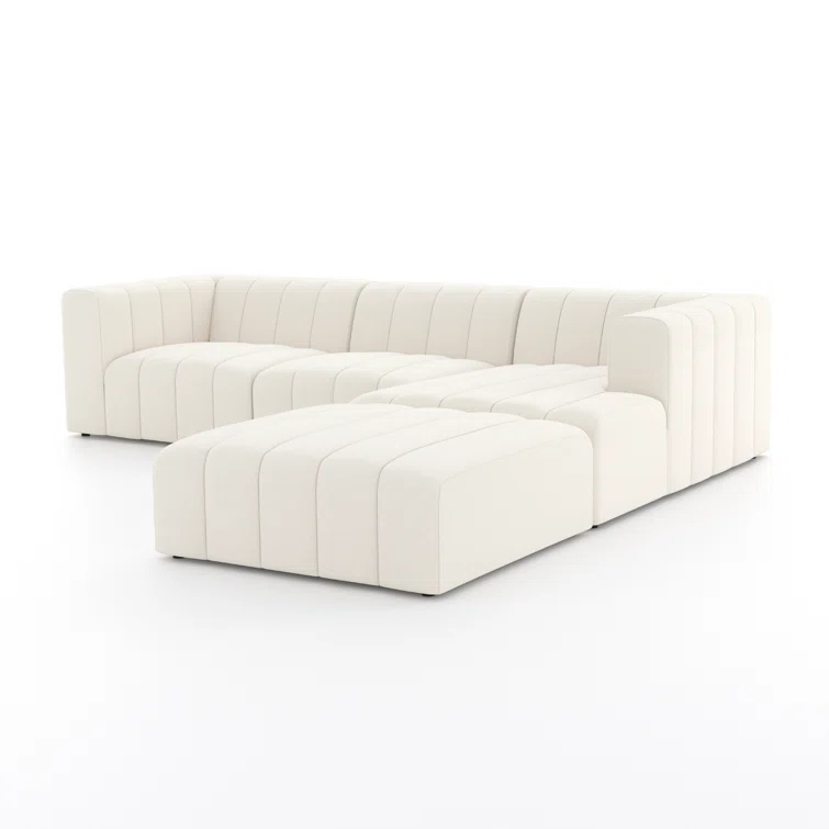 Fayette Cloud Tufted Faux Leather Three Piece Sectional with Ottoman