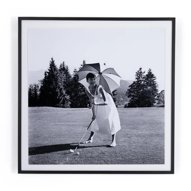 Golfing Hepburn Framed Print
