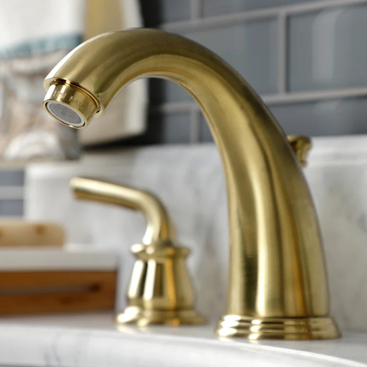 Kingston Brass Restoration Two-Handle 3-Hole Deck Mount Widespread Bathroom Faucet with Retail Pop-Up Drain
