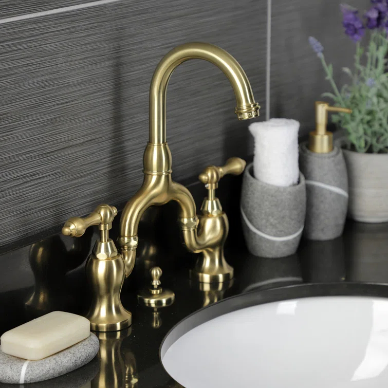 Kingston Brass English Country Two-Handle 3-Hole Deck Mount Bridge Bathroom Faucet with Brass Pop-Up