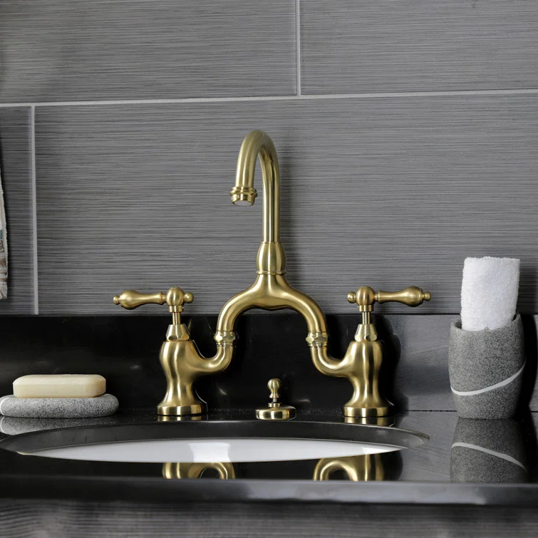 Kingston Brass English Country Two-Handle 3-Hole Deck Mount Bridge Bathroom Faucet with Brass Pop-Up