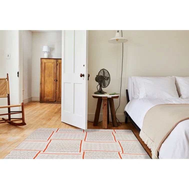 Ivory and Orange Rectangular Synthetic Indoor/Outdoor Rug