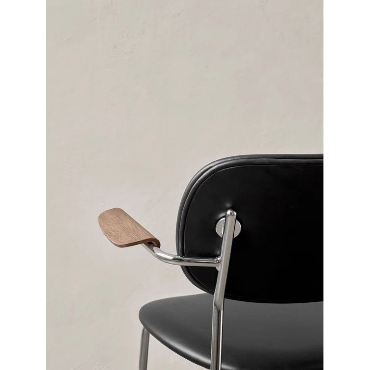 Cozy Minimalist Black Leather and Chrome Dining Chair with Armrests