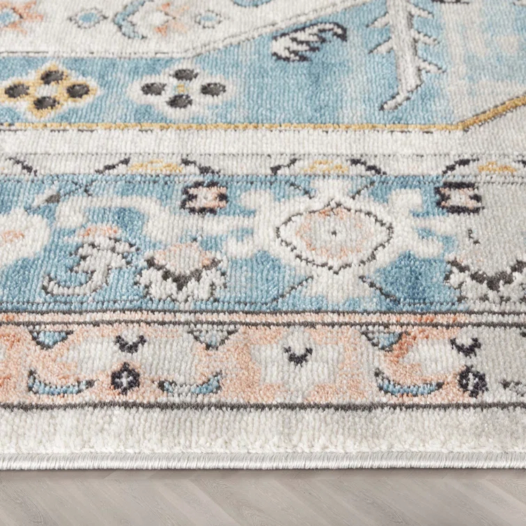 Espinal Oriental Blue/Ivory Area Rug