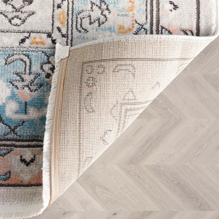 Espinal Oriental Blue/Ivory Area Rug