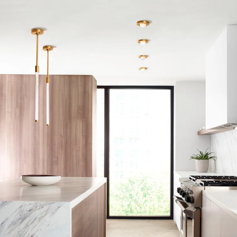 Ebell Modern LED Flush Mount in Natural Brass with Domed Glass