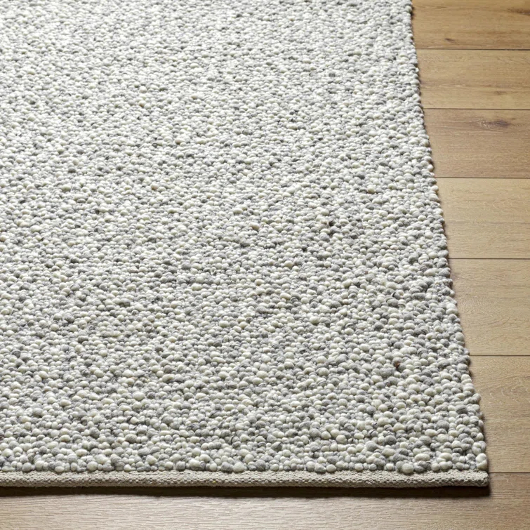 Handmade Ivory Wool and Synthetic 5' x 7' Rectangular Rug