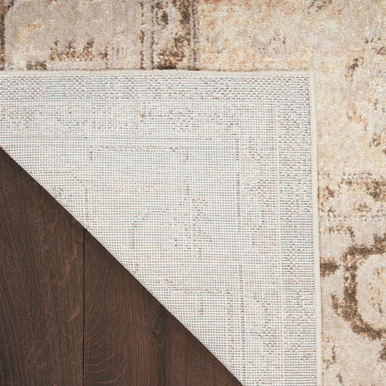 Haydel Oriental Machine Washable Power Loom Polyester Area Rug in Beige
