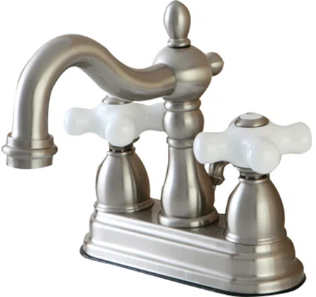 Kingston Brass Heritage Two-Handle 3-Hole Deck Mount 4" Centerset Bathroom Faucet with Plastic Pop-Up